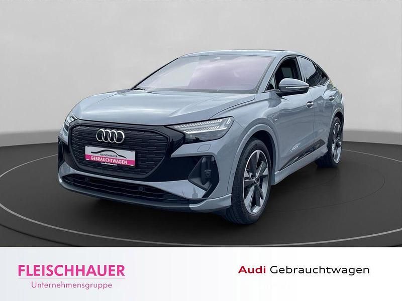 Grau Gebraucht 2022 Audi Q4 Sportback e-tron S-Line SUV | 37.690 € (Guter Preis) - Bild 1/4