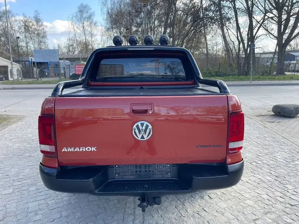 Second-hand VW Amarok 179 CP (131 kW) 2013 Portocaliu Pickup