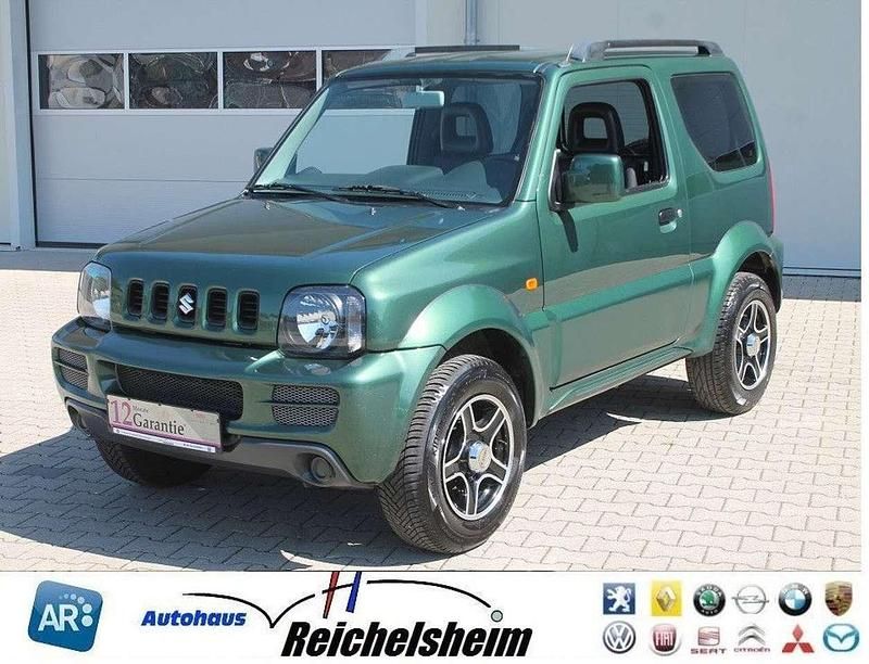 Grün Gebraucht 2012 Suzuki Jimny Ranger SUV | 12.999 € (Teuer) - Bild 1/4