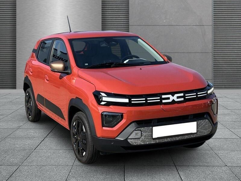 Brick red Gebraucht 2024 Dacia Spring Extreme Kleinwagen | 16.479 € (Fairer Preis) - Bild 1/4