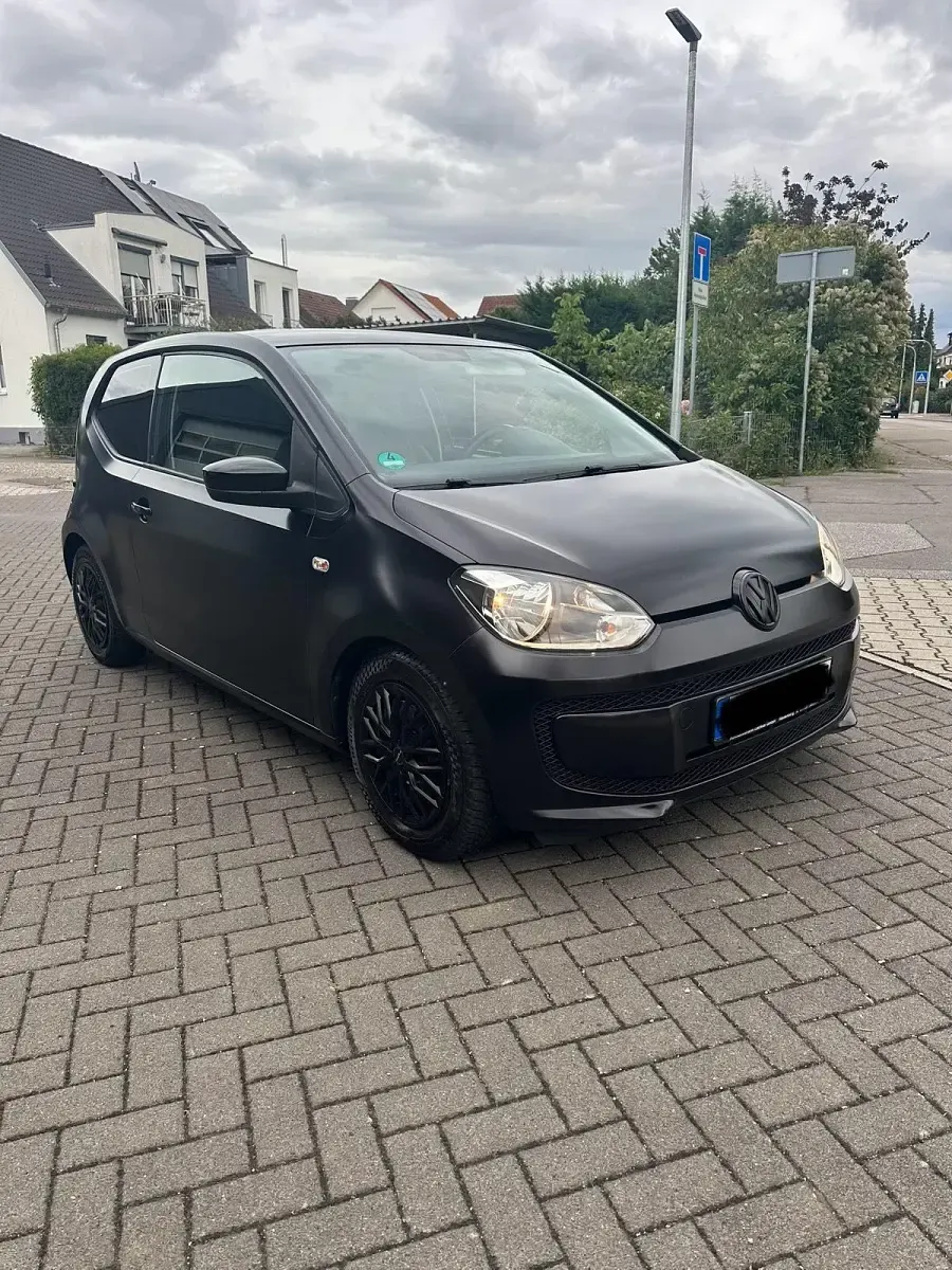 Używany VW up! 60 KM (44 kW) 2014 Czarny Hatchback