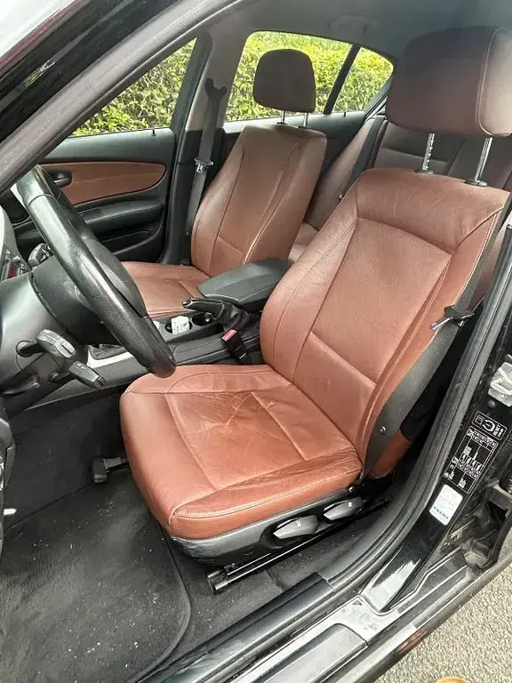 Gebraucht BMW 116 Lifestyle 116 PS (85 kW) 2011 Schwarz Kleinwagen