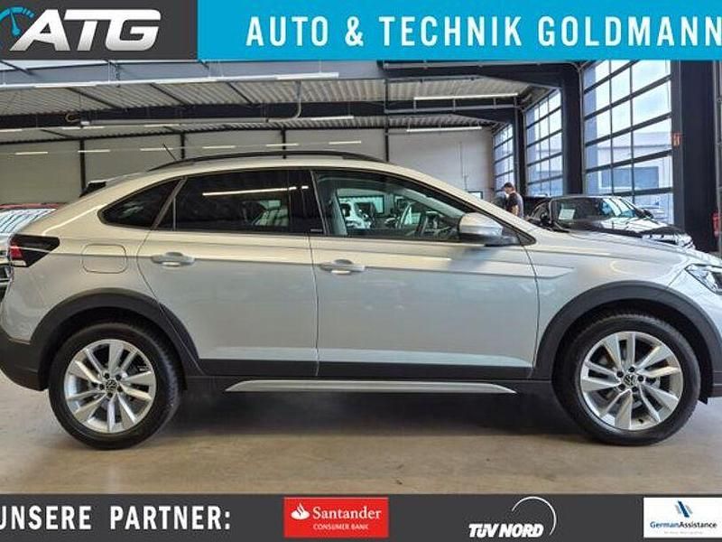 Reflexsilber metallic Gebraucht 2024 VW Taigo Move SUV | 24.390 € (Guter Preis) - Bild 1/4