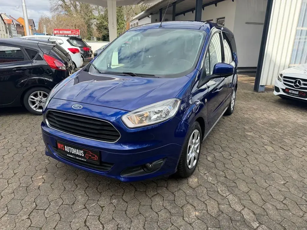 Gebraucht Ford Tourneo Courier Trend 101 PS (74 kW) 2015 Blau Van / Kleinbus