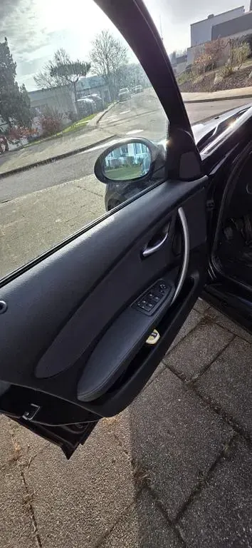 Gebraucht BMW 116 122 PS (89 kW) 2008 Schwarz Kleinwagen