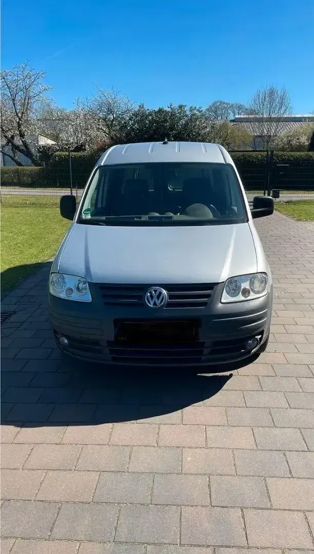Second-hand VW Caddy Maxi 105 CP (77 kW) 2009 Argintiu Monovolum
