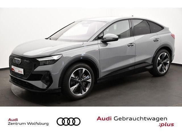 Kieselgrau Gebraucht 2024 Audi Q4 Sportback e-tron Ambiente SUV | 48.690 € (Fairer Preis) - Bild 1/2