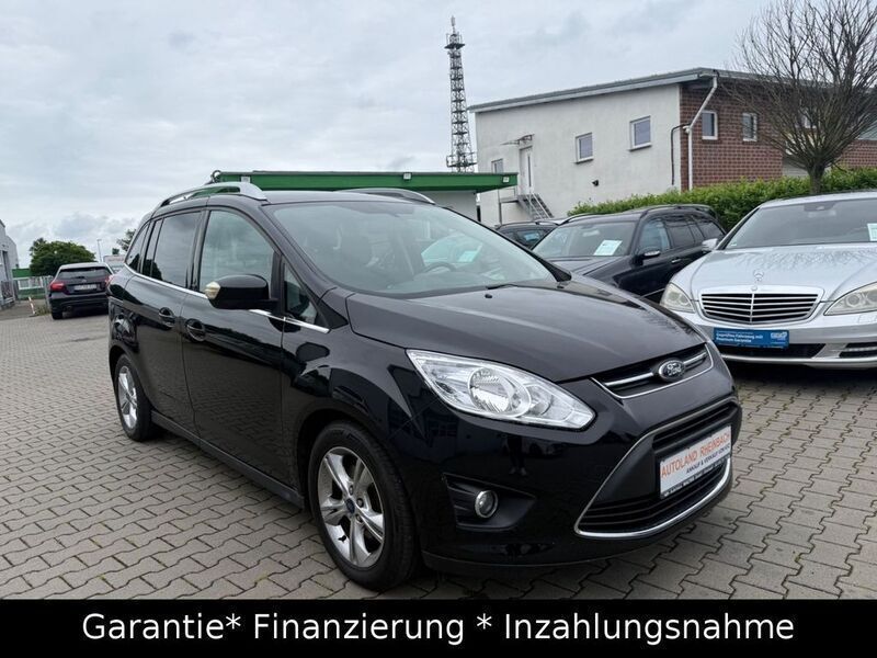 Schwarz Gebraucht 2012 Ford Grand C-Max Champions Edition Van / Kleinbus | 5.900 € (Fairer Preis) - Bild 1/4