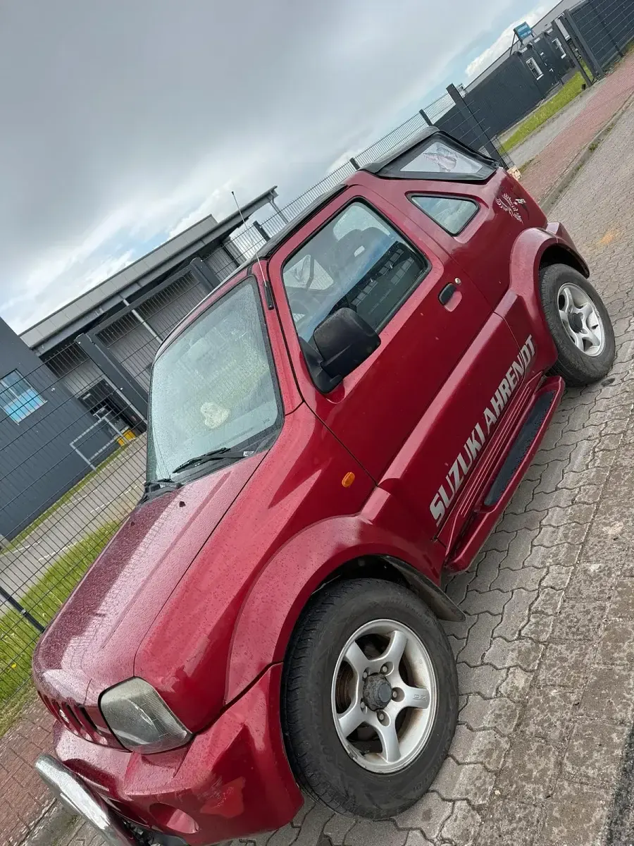 Second-hand Suzuki Jimny 86 CP (63 kW) 2000 Roșu SUV