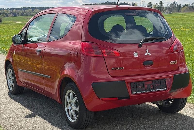 Second-hand Mitsubishi Colt Inform 75 CP (55 kW) 2008 Roșu Berlinǎ