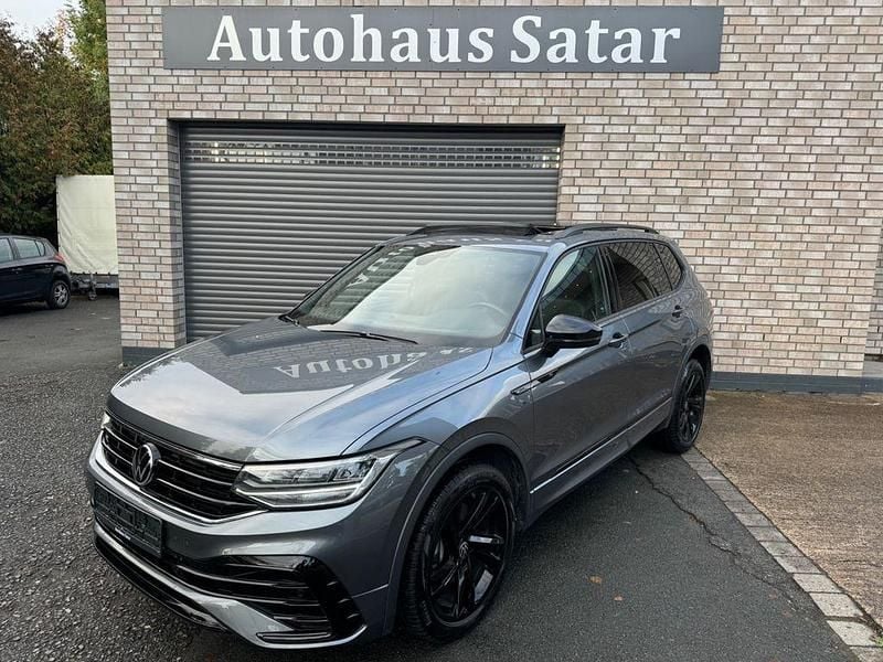 Grau Gebraucht 2024 VW Tiguan Allspace R-line SUV | 35.999 € (Superpreis) - Bild 1/4