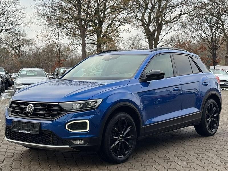 Ravennablau Gebraucht 2021 VW T-Roc Sportline SUV | 24.980 € (Fairer Preis) - Bild 1/4