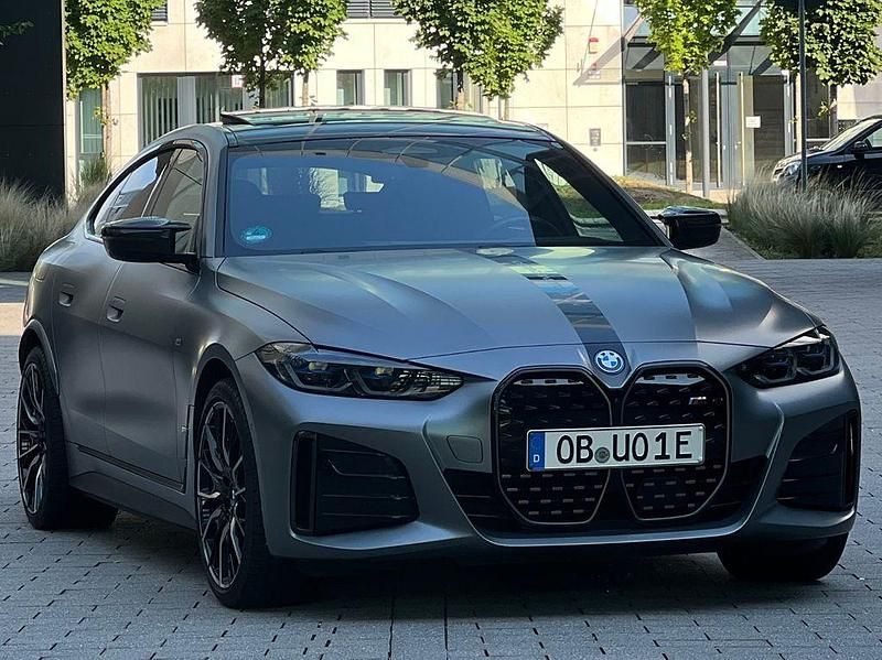 Grau Gebraucht 2023 BMW i4 Exclusive Limousine | 57.400 € (Teuer) - Bild 1/4