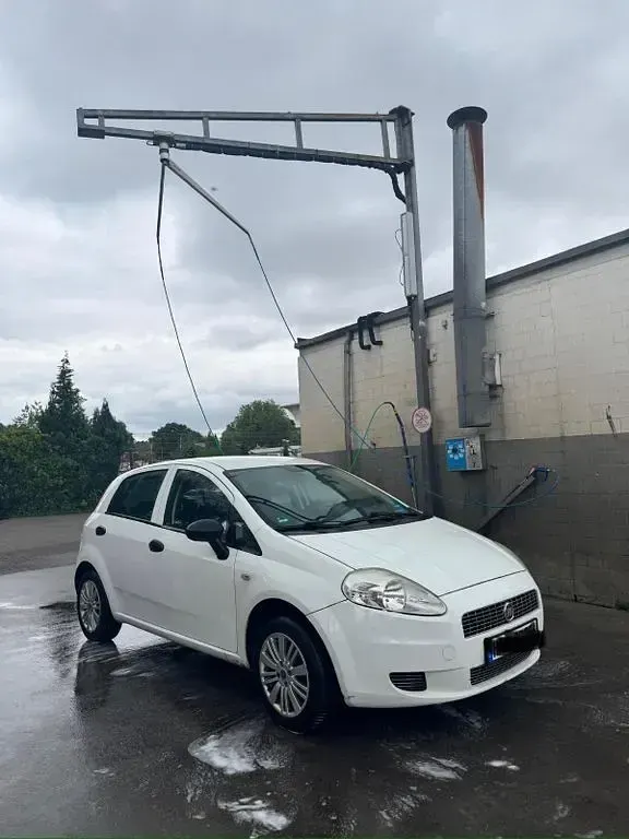 Gebraucht Fiat Grande Punto 77 PS (56 kW) 2009 Weiß Kleinwagen