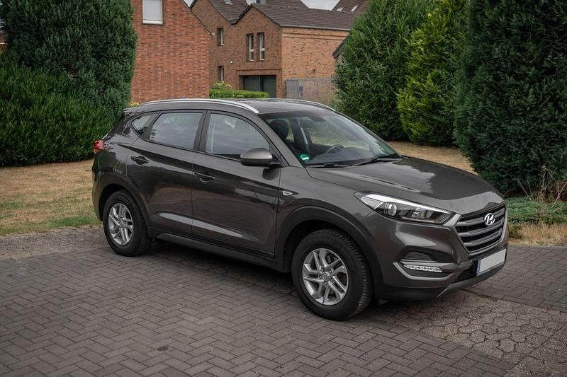 Braun Gebraucht 2018 Hyundai Tucson Trend SUV | 13.999 € (Fairer Preis) - Bild 1/4