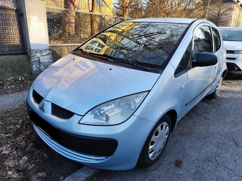 Second-hand Mitsubishi Colt Inform 75 CP (55 kW) 2006 Argintiu Berlinǎ