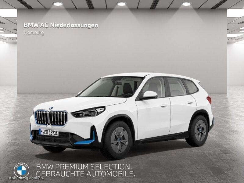 Weiß Gebraucht 2023 BMW iX1 Performance SUV | 38.707 € (Teuer) - Bild 1/3
