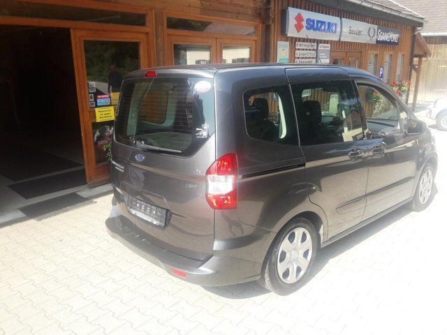 Gebraucht Ford Tourneo Courier Trend 101 PS (74 kW) 2016 Grau metallic Van / Kleinbus