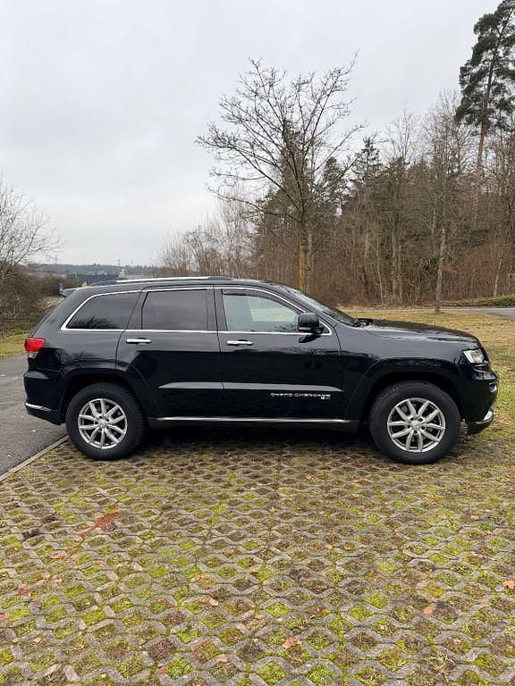 Schwarz Gebraucht 2014 Jeep Grand Cherokee Summit SUV | 17.500 € (Fairer Preis) - Bild 1/4