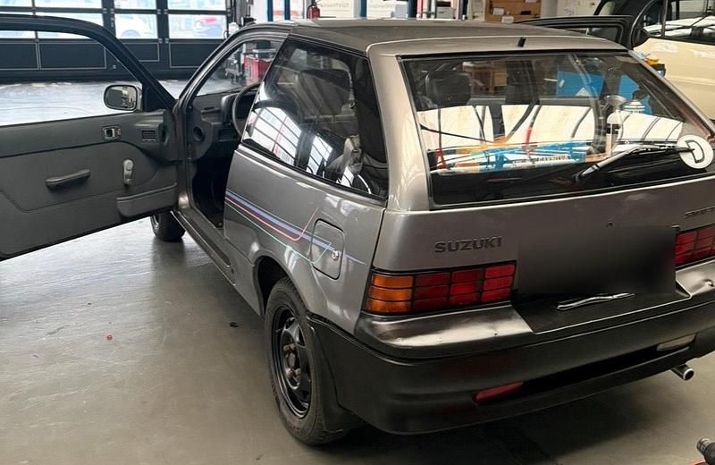 Gebraucht Suzuki Swift 54 PS (39 kW) 1991 Grau Kleinwagen