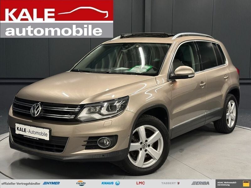 Beige metallic (titanium beige metallic) Gebraucht 2013 VW Tiguan Sportline SUV | 11.890 € (Guter Preis) - Bild 1/4
