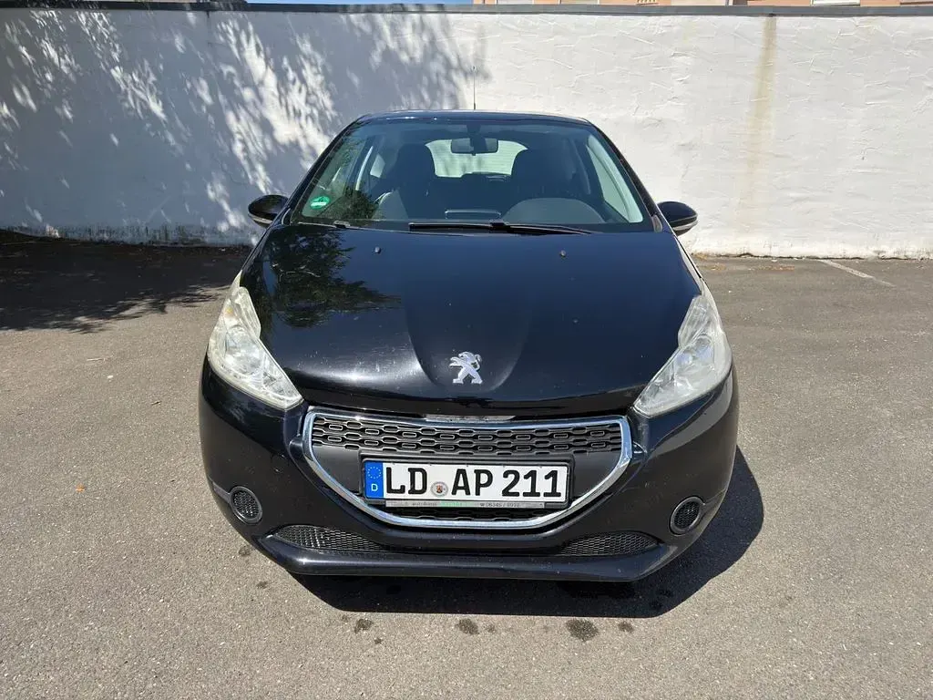Gebraucht Peugeot 208 Active 95 PS (69 kW) 2012 Schwarz Kleinwagen