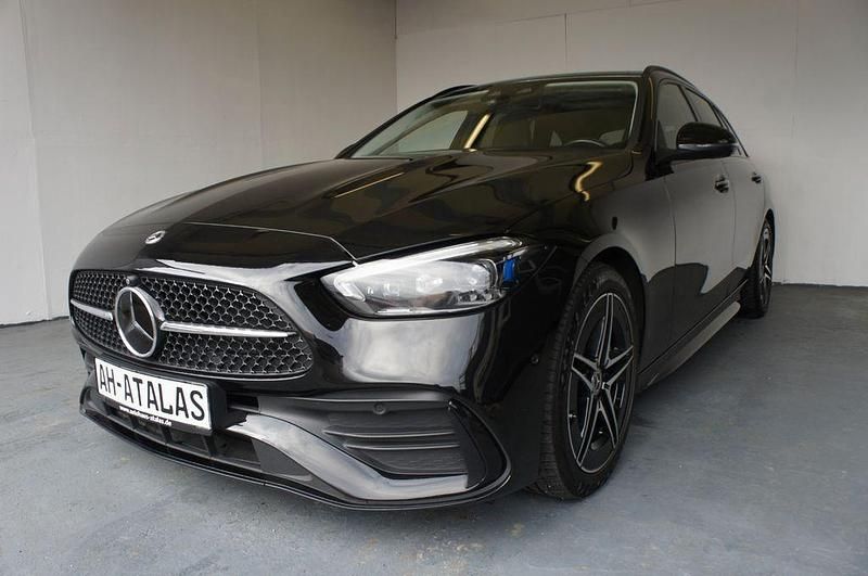Schwarz Gebraucht 2022 Mercedes C220 AMG line Limousine | 33.900 € - Bild 1/4