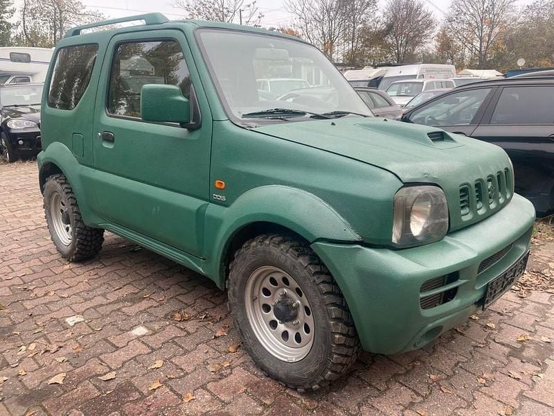 Grün Gebraucht 2009 Suzuki Jimny Ranger SUV | 5.900 € - Bild 1/4