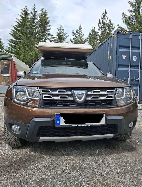 Braun Gebraucht 2014 Dacia Duster Celebration SUV | 3.900 € - Bild 1/4