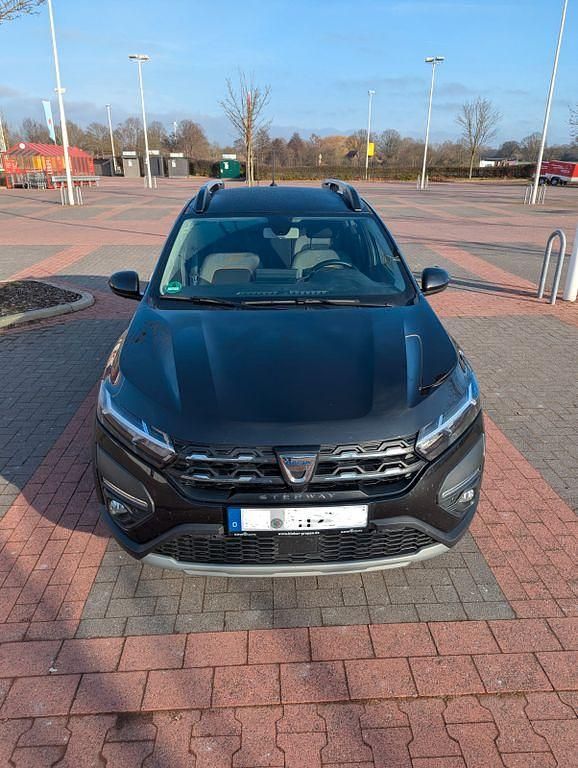 Schwarz Gebraucht 2023 Dacia Sandero Comfort Limousine | 13.499 € (Fairer Preis) - Bild 1/4