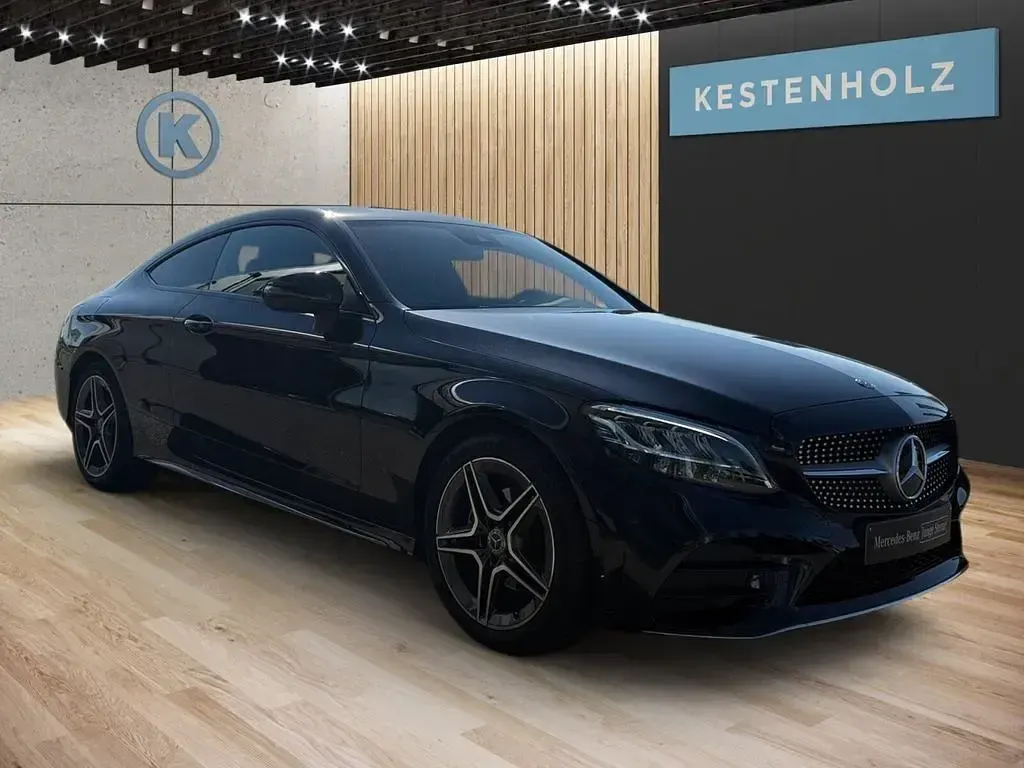 Gebraucht Mercedes C200 AMG 184 PS (135 kW) 2021 Lack obsidianschwarz Coupé