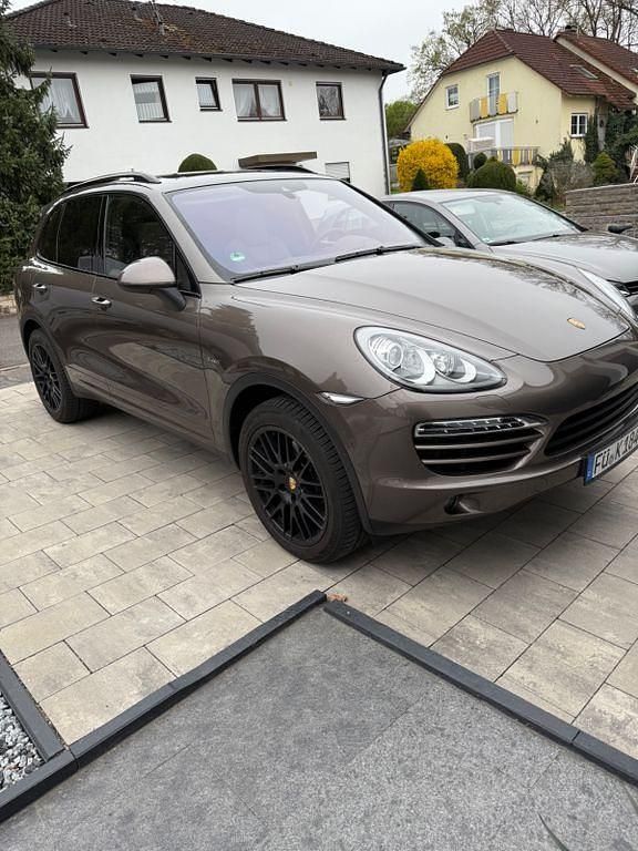 Braun Gebraucht 2013 Porsche Cayenne SUV | 26.400 € (Fairer Preis) - Bild 1/4