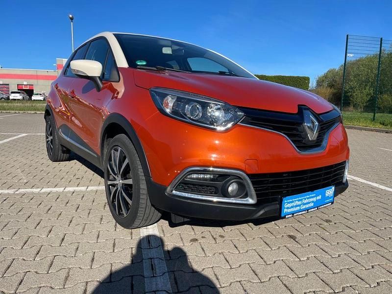 Używany Renault Captur Luxe 90 KM (66 kW) 2015 Pomarańczowy SUV