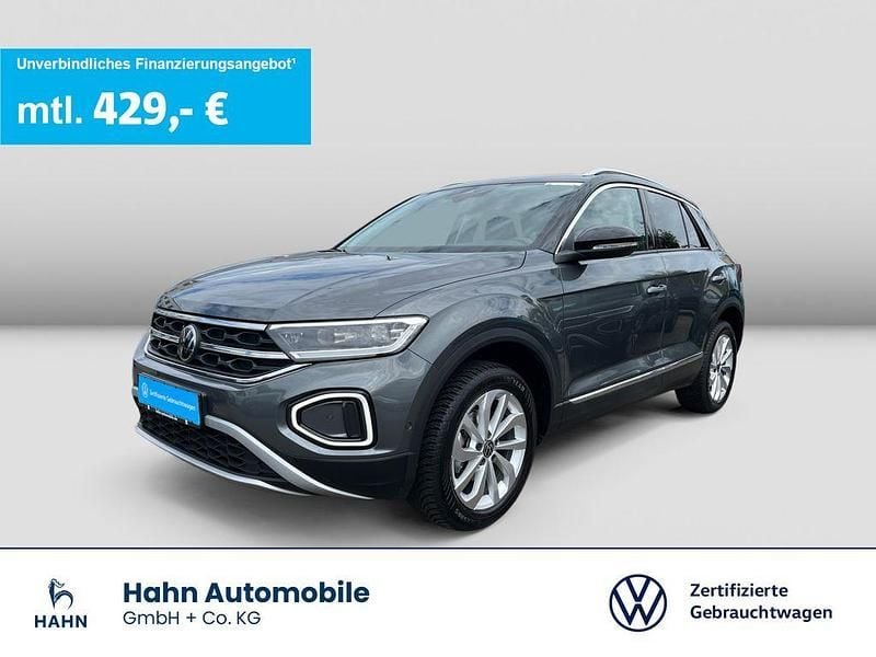 Indiumgrau metallic Gebraucht 2024 VW T-Roc Style SUV | 27.499 € (Guter Preis) - Bild 1/3