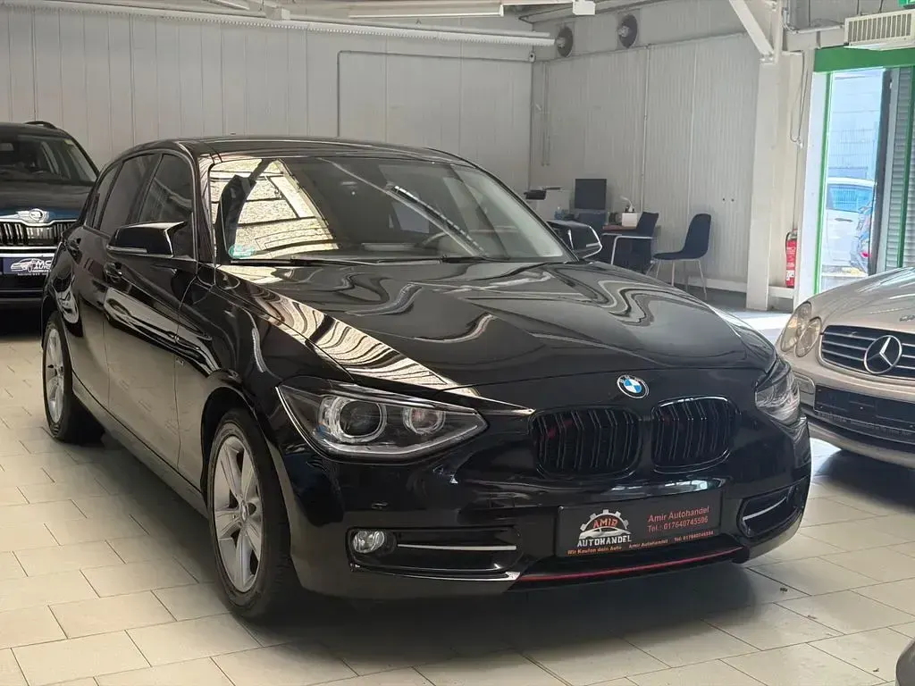Używany BMW 116 Performance 136 KM (100 kW) 2012 Czarny Hatchback