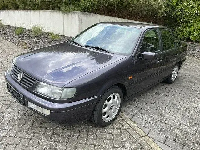 Używany VW Passat Exclusive 174 KM (127 kW) 1994 Purpurowy Kombi