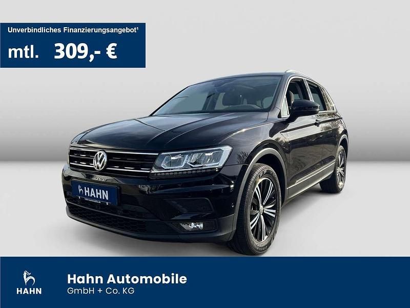 Deep black perleffekt Gebraucht 2018 VW Tiguan Comfortline SUV | 22.830 € (Etwas zu teuer) - Bild 1/3