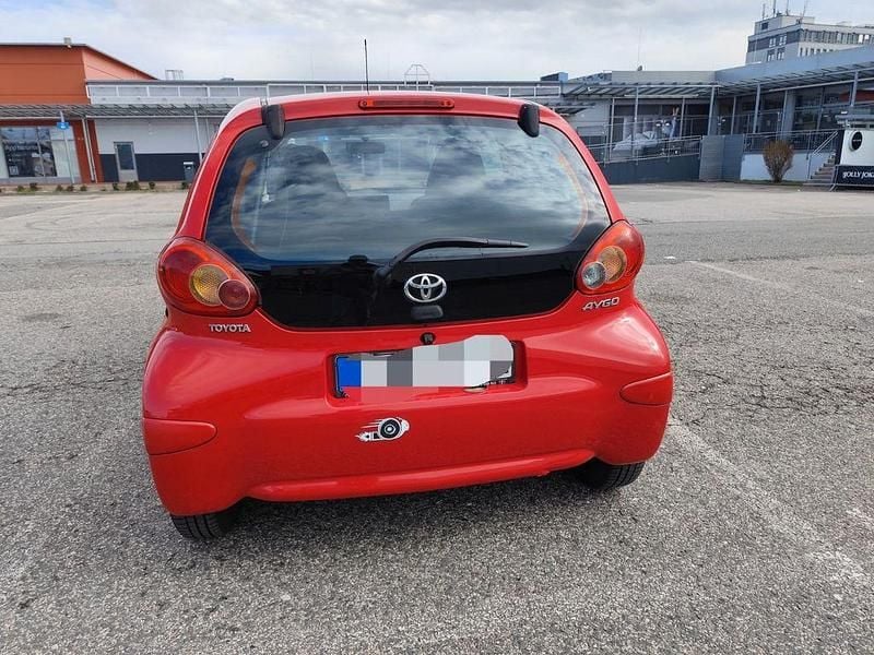 Gebraucht Toyota Aygo 68 PS (50 kW) 2007 Rot Kleinwagen