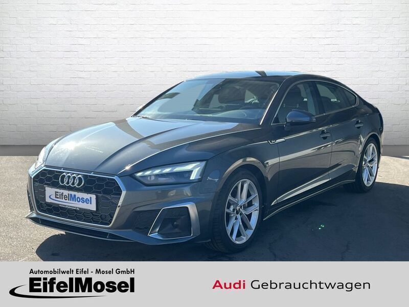Grau Gebraucht 2024 Audi A5 Sportback S-Line Limousine | 39.470 € (Superpreis) - Bild 1/4