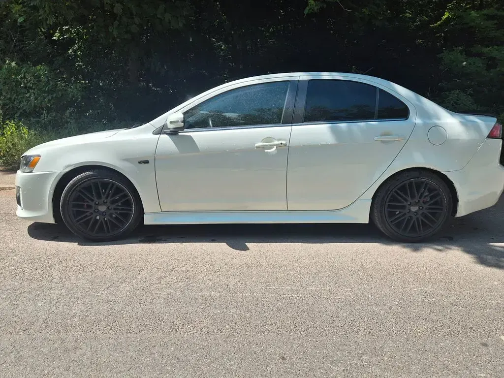 Gebraucht Mitsubishi Lancer Basis 117 PS (86 kW) 2017 Weiß Limousine