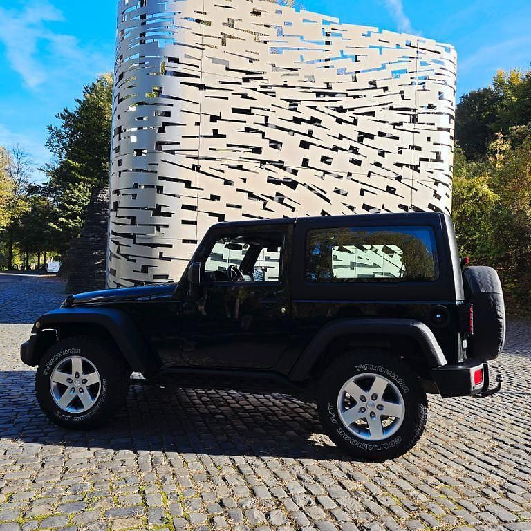 Schwarz Gebraucht 2012 Jeep Wrangler Sport SUV | 25.200 € (Fairer Preis) - Bild 1/4