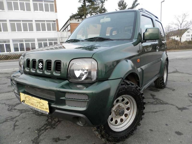Grün Gebraucht 2012 Suzuki Jimny Ranger SUV | 9.900 € (Fairer Preis) - Bild 1/4
