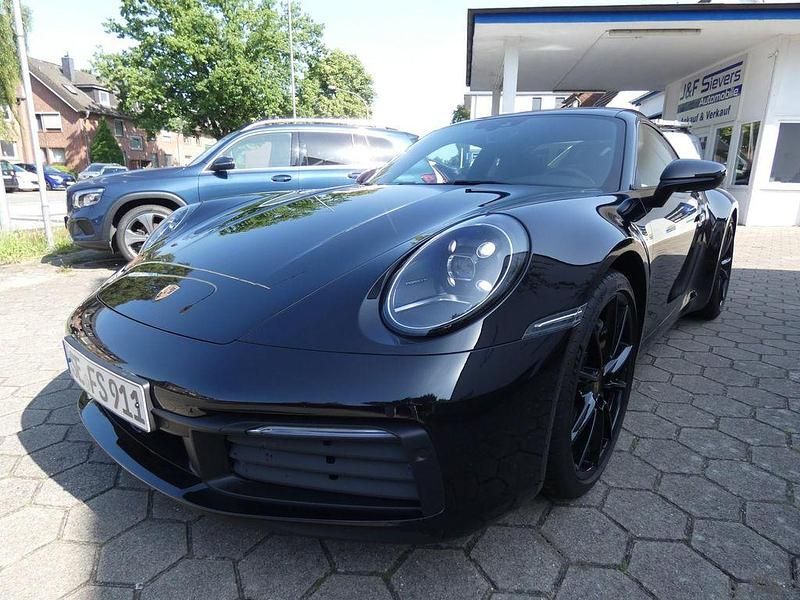 Schwarz Gebraucht 2023 Porsche 911 Carrera Sport | 127.990 € (Fairer Preis) - Bild 1/4