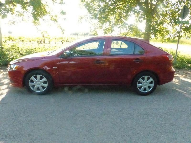 Gebraucht Mitsubishi Lancer Sportback Basis 117 PS (86 kW) 2015 Rot Limousine