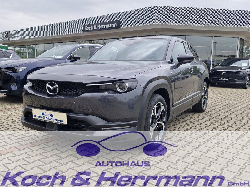 Grau Neu 2025 Mazda MX30 Makoto SUV | 26.999 € - Bild 1/4
