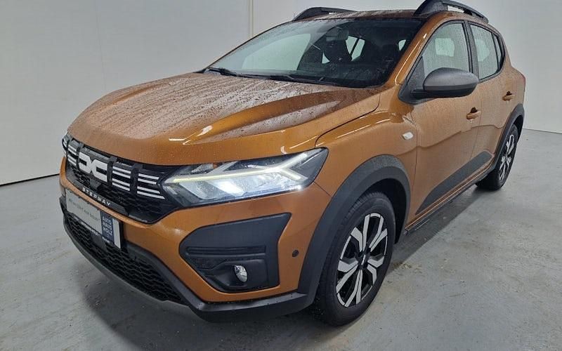 Taklamakanorange Gebraucht 2023 Dacia Sandero Expression Kleinwagen | 15.190 € (Fairer Preis) - Bild 1/4