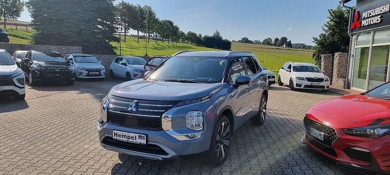 Mondsteingrau Neu 2025 Mitsubishi Outlander P-HEV Edition SUV | 52.990 € (Fairer Preis) - Bild 1/4