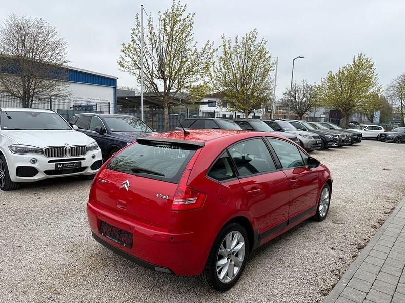 Second-hand Citroën C4 Style 90 CP (66 kW) 2010 Roșu Berlinǎ