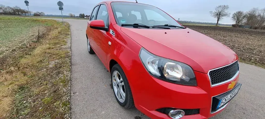 Gebraucht Chevrolet Aveo LT 101 PS (74 kW) 2011 Rot Limousine