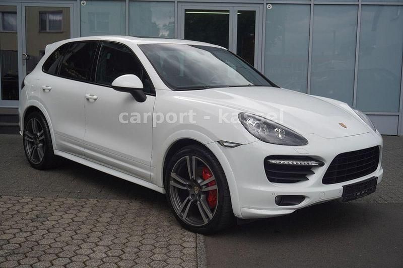 Pure white Gebraucht 2012 Porsche Cayenne Turbo Sport SUV | 28.990 € - Bild 1/4